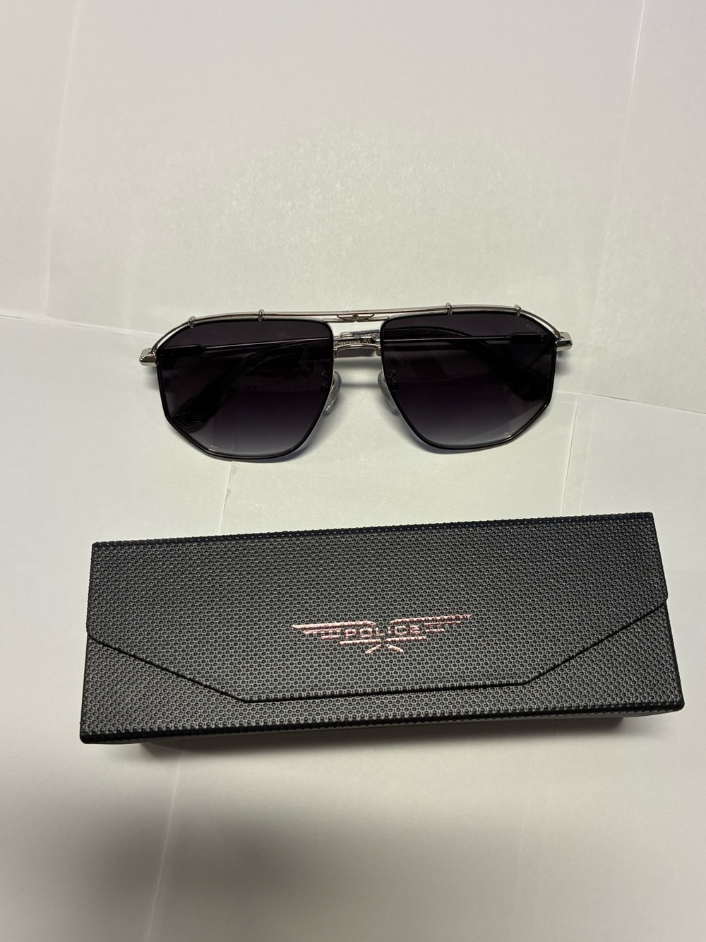 Police Silver Frame Sunglasses with Black Gradient Lenses